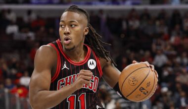 Nov 21, 2025; Chicago, Illinois, USA; Chicago Bulls guard Ayo Dosunmu (11) drives to the basket against the Miami Heat during the first half at United Center. Mandatory Credit: Kamil Krzaczynski-Imagn Images
