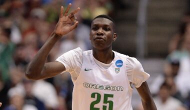 March 24, 2016; Anaheim, CA, USA; Oregon Ducks forward Chris Boucher (25) reacts to the three point basket by forward Dillon Brooks (24) against Duke Blue Devils during the first half of the semifinal game in the West regional of the NCAA Tournament at Honda Center. Mandatory Credit: Robert HanashiroImagn Images