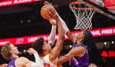 Feb 5, 2026; Atlanta, Georgia, USA; Atlanta Hawks forward Jalen Johnson (1) has his shot blocked by Utah Jazz forward Cody Williams (5) in the first quarter at State Farm Arena. Mandatory Credit: Brett Davis-Imagn Images