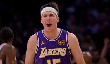 Feb 5, 2026; Los Angeles, California, USA;  Los Angeles Lakers guard Austin Reaves (15) reacts at the buzzer defeating the Philadelphia 76ers at Crypto.com Arena. Mandatory Credit: Jayne Kamin-Oncea-Imagn Images