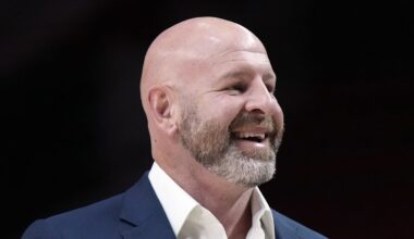 Oct 25, 2024; Portland, Oregon, USA; Portland Trail Blazers general manager Joe Cronin smiles as players warm up before a game against the New Orleans Pelicans at Moda Center. Mandatory Credit: Soobum Im-Imagn Images