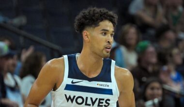 Oct 7, 2025; Minneapolis, Minnesota, USA; Minnesota Timberwolves forward Johnny Juzang (9) follows the play against the Indiana Pacers during the fourth quarter at Target Center. Mandatory Credit: Nick Wosika-Imagn Images