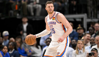 Oct 27, 2025; Dallas, Texas, USA; Oklahoma City Thunder center Isaiah Hartenstein (55) looks to pass the ball during the game between the Mavericks and the Thunder at the American Airlines Center. Mandatory Credit: Jerome Miron-Imagn Images