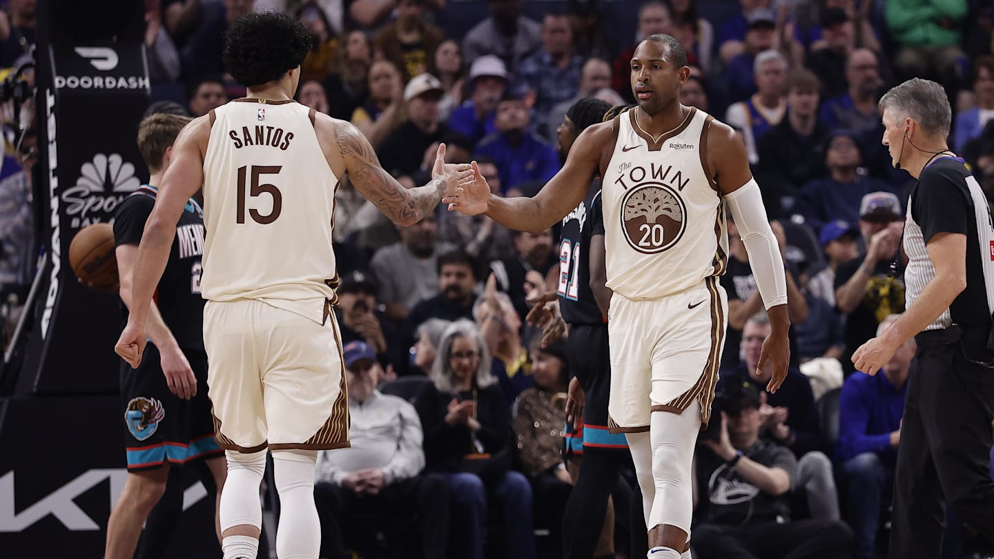 Feb 9, 2026; San Francisco, California, USA; Golden State Warriors forward Gui Santos (15) high fives center Al Horford (20) after Horford scored against the Memphis Grizzlies during the first quarter at Chase Center. Mandatory Credit: Kelley L Cox-Imagn Images