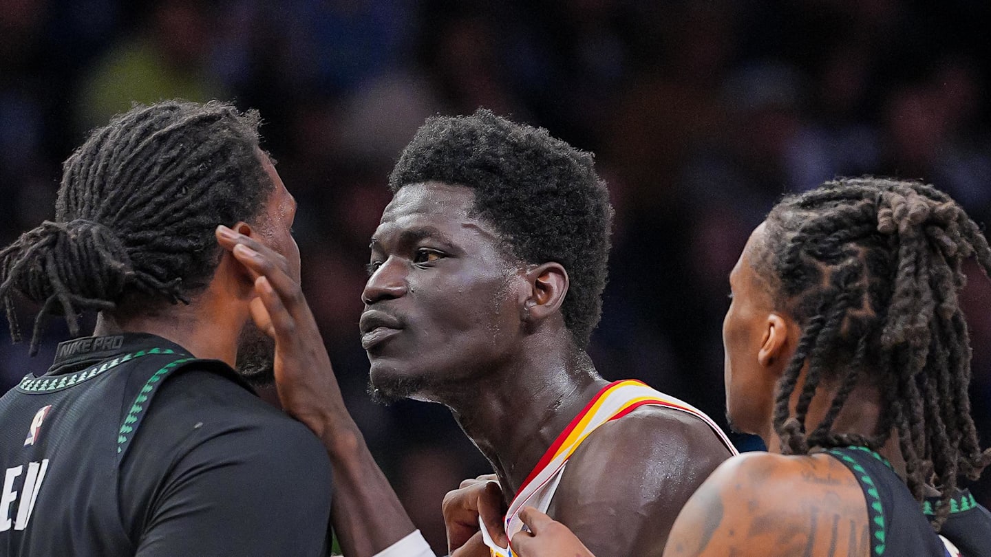 Mouhamed Gueye (18) and Minnesota Timberwolves center Naz Reid (11) push each other in the fourth quarter at Target Center.