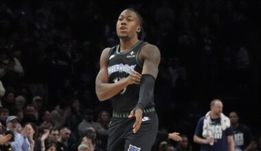 Feb 8, 2026; Minneapolis, Minnesota, USA; Minnesota Timberwolves guard Ayo Dosunmu (13) enters the game for the first time as a member of the team and receives a standing ovation as he readies to play the Los Angeles Clippers in the first quarter at Target Center. Mandatory Credit: Bruce Kluckhohn-Imagn Images