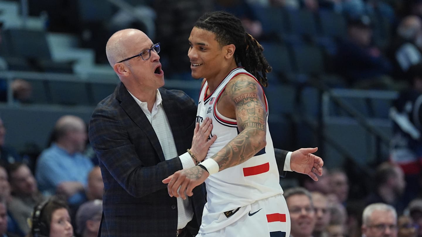 UConn Huskies head coach Dan Hurley reacts with guard Solo Ball (1)