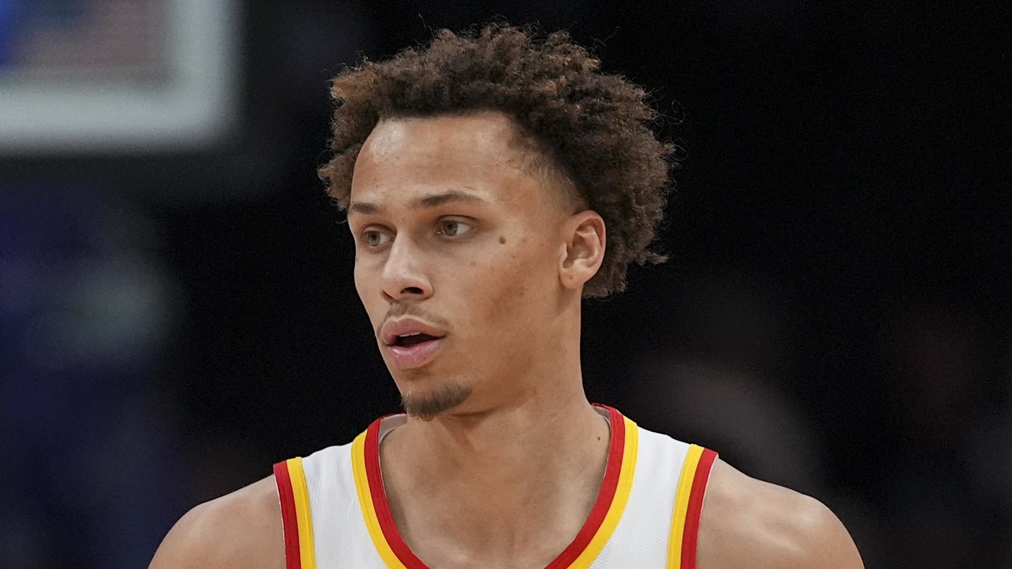 Hawks guard Dyson Daniels (5) brings the ball up court against the Charlotte Hornets during first quarter at Spectrum Center.