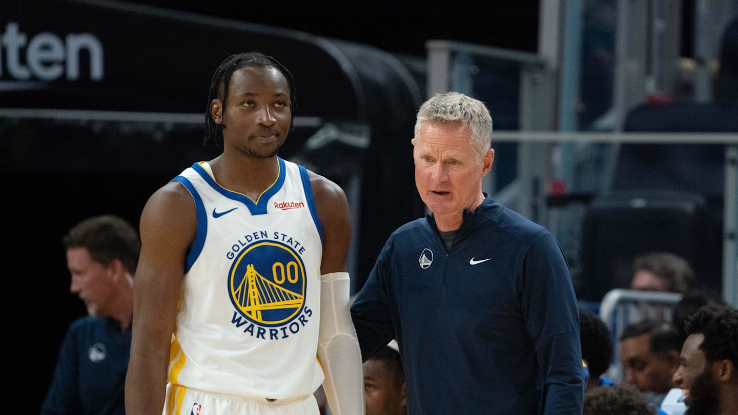 October 20, 2023; San Francisco, California, USA; Golden State Warriors head coach Steve Kerr (right) talks to forward Jonathan Kuminga (00) during the third quarter against the San Antonio Spurs at Chase Center. Mandatory Credit: Kyle Terada-Imagn Images