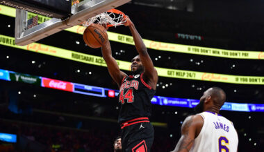 Mar 26, 2023; Los Angeles, California, USA; Chicago Bulls forward Patrick Williams (44) dunks for the basket in front of Los Angeles Lakers forward LeBron James (6) during the second half at Crypto.com Arena. Mandatory Credit: Gary A. Vasquez-Imagn Images