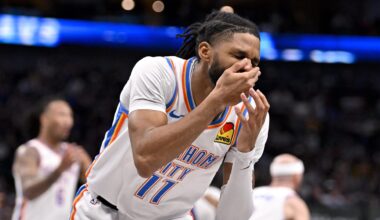 Jan 17, 2025; Dallas, Texas, USA; Oklahoma City Thunder guard Isaiah Joe (11) reacts to being hit in the face during the second half against the Dallas Mavericks at the American Airlines Center. Mandatory Credit: Jerome Miron-Imagn Images