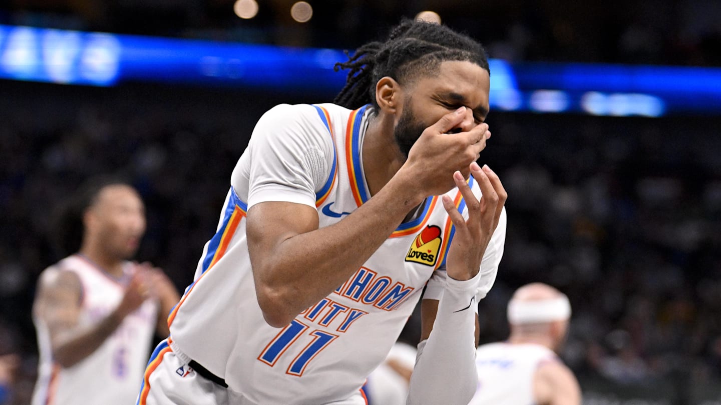 Jan 17, 2025; Dallas, Texas, USA; Oklahoma City Thunder guard Isaiah Joe (11) reacts to being hit in the face during the second half against the Dallas Mavericks at the American Airlines Center. Mandatory Credit: Jerome Miron-Imagn Images