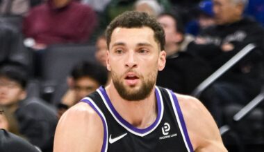 Feb 4, 2026; Sacramento, California, USA; Sacramento Kings guard Zach LaVine (8) dribbles past Memphis Grizzlies guard Kentavious Caldwell-Pope (3) during the third quarter at Golden 1 Center. Mandatory Credit: Ed Szczepanski-Imagn Images