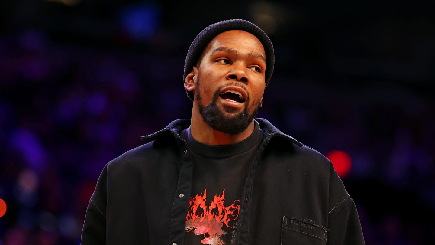 Nov 20, 2024; Phoenix, Arizona, USA; Phoenix Suns forward Kevin Durant looks on from the sidelines during the game between the Phoenix Suns and the New York Knicks at Footprint Center. Mandatory Credit: Mark J. Rebilas-Imagn Images