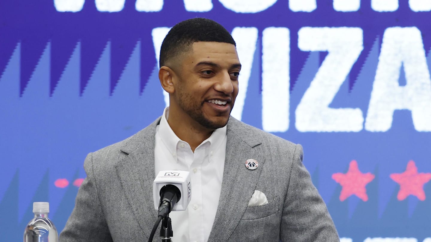 Jan 9, 2026; Washington, District of Columbia, USA; Washington Wizards general manager Will Dawkins (L) introduces newly acquired Wizards guard Trae Young (R) at a press conference prior to the Wizards' game against the New Orleans Pelicans at Capital One Arena. Mandatory Credit: Geoff Burke-Imagn Images