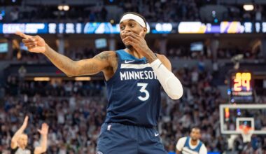Apr 27, 2025; Minneapolis, Minnesota, USA; Minnesota Timberwolves forward Jaden McDaniels (3) celebrates a three pointer made against the Los Angeles Lakers in the third quarter during game four of first round for the 2025 NBA Playoffs at Target Center. Mandatory Credit: Matt Blewett-Imagn Images