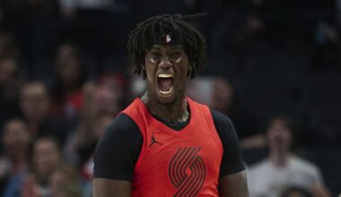 Jan 9, 2026; Portland, Oregon, USA; Portland Trail Blazers guard Sidy Cissoko (91) celebrates after scoring a three point basket during the first half against Houston Rockets forward Jabari Smith Jr. (10) at Moda Center. Mandatory Credit: Troy Wayrynen-Imagn Images
