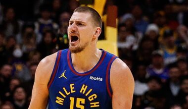 Nov 29, 2025; Phoenix, Arizona, USA; Denver Nuggets center Nikola Jokic (15) reacts against the Phoenix Suns at the Mortgage Matchup Center. Mandatory Credit: Mark J. Rebilas-Imagn Images