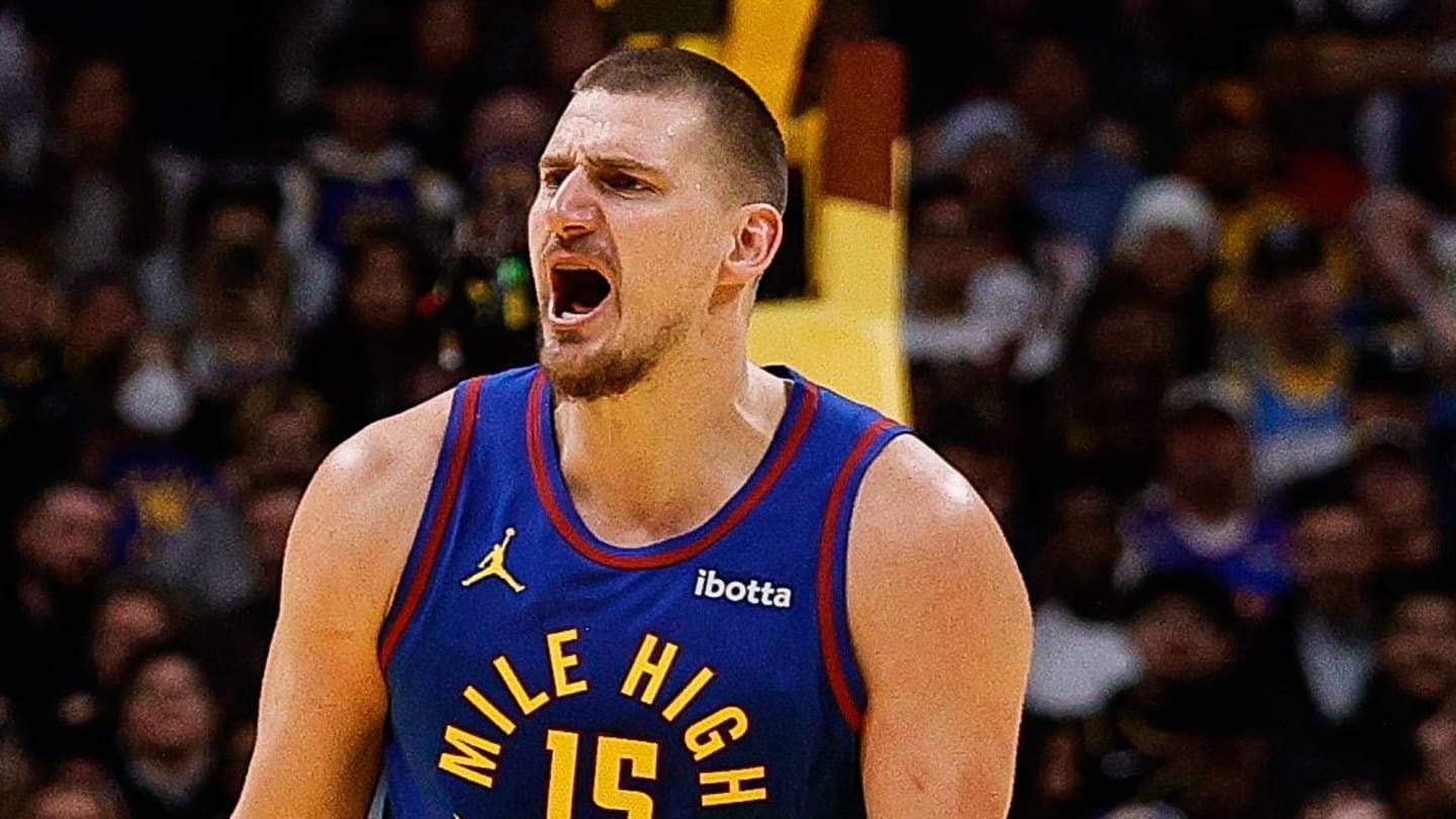 Nov 29, 2025; Phoenix, Arizona, USA; Denver Nuggets center Nikola Jokic (15) reacts against the Phoenix Suns at the Mortgage Matchup Center. Mandatory Credit: Mark J. Rebilas-Imagn Images