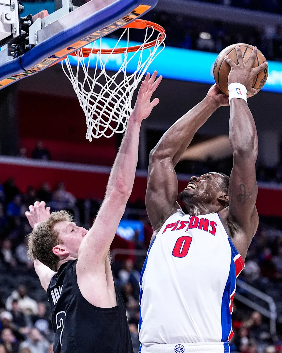 Detroit Pistons center Jalen Duren (0) goes to the basket against Brooklyn Nets forward Danny Wolf (2) during the first half at Little Caesars Arena in Detroit on Sunday, February 1, 2026.