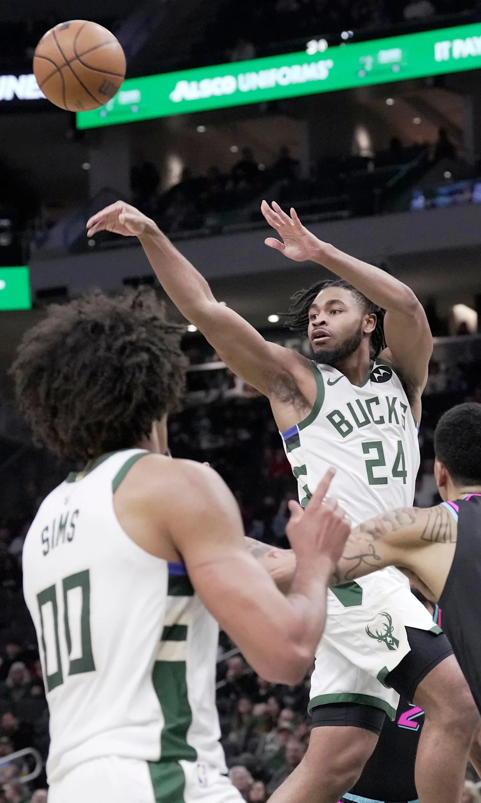 Milwaukee Bucks guard Cam Thomas (24) finds an open teammate during the second half of their game Tuesday, February 24, 2026 at Fiserv Forum in Milwaukee, Wisconsin. The Milwaukee Bucks beat the Miami Heat 128-117.