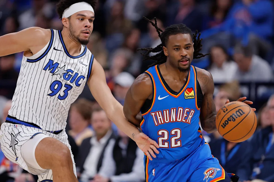 Feb 3, 2026; Oklahoma City, Oklahoma, USA; Orlando Magic guard/forward Noah Penda (93) defends a drive by Oklahoma City Thunder guard Shai Gilgeous-Alexander (2) during the second half at Paycom Center. Mandatory Credit: Alonzo Adams-Imagn Images