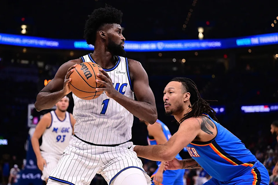 OKLAHOMA CITY, OKLAHOMA - FEBRUARY 3: Jonathan Isaac #1 of the Orlando Magic handles the ball while being defended by Jaylin Williams #6 of the Oklahoma City Thunder during the second half at Paycom Center on February 3, 2026 in Oklahoma City, Oklahoma. NOTE TO USER: User expressly acknowledges and agrees that, by downloading and or using this photograph, User is consenting to the terms and conditions of the Getty Images License Agreement. (Photo by Joshua Gateley/Getty Images)