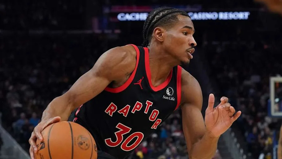 Toronto Raptors guard Ochai Agbaji drives to the basket against the Golden State Warriors