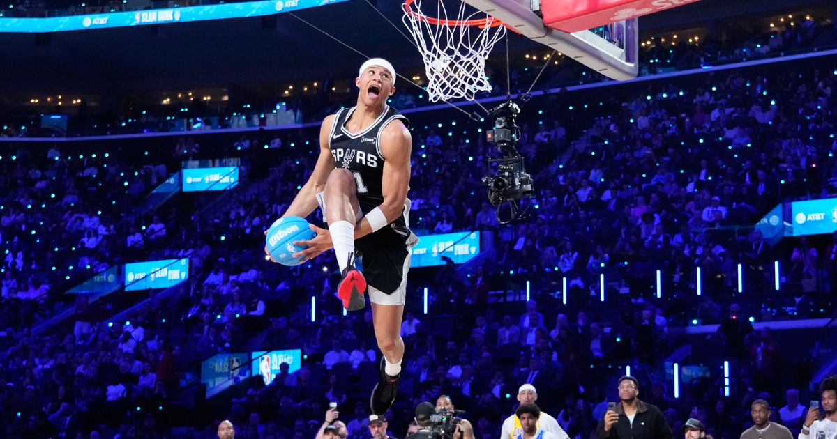 Heat's Keshad Johnson soars to a slam dunk title, edging Carter Bryant who had a perfect score :: WRAL.com