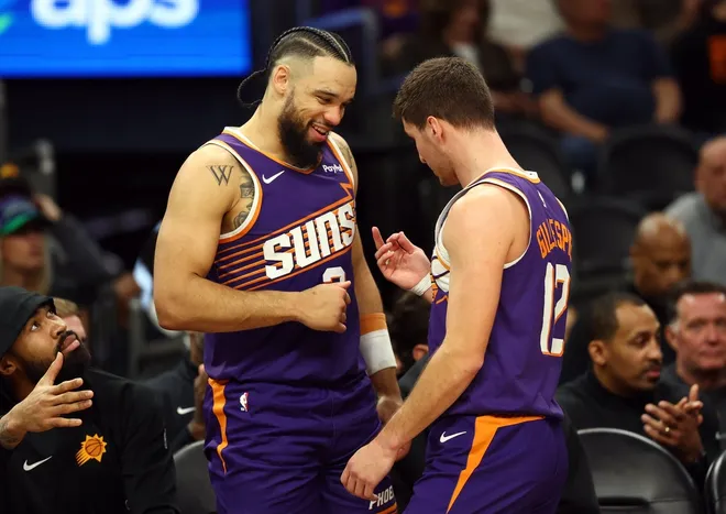 Jan 30, 2026; Phoenix, Arizona, USA; Phoenix Suns forward Dillon Brooks (3) celebrates with guard Collin Gillespie (12) against the Cleveland Cavaliers in the second half at Mortgage Matchup Center.