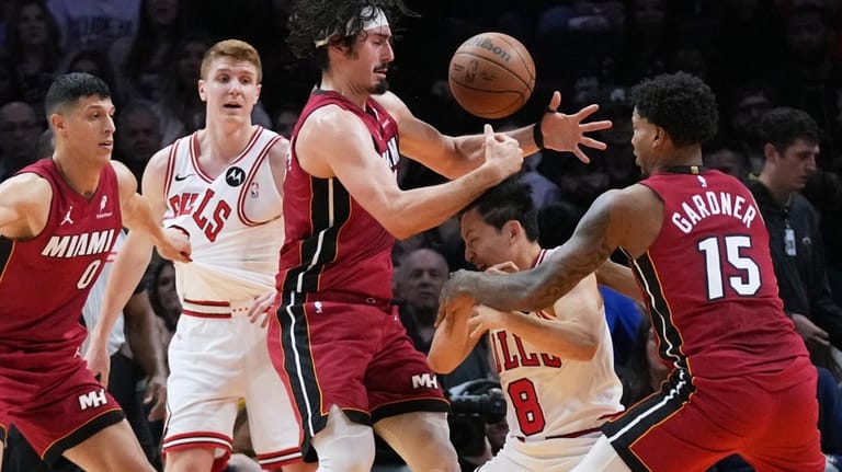 Miami Heat forward Jaime Jaquez Jr., third from left, and...