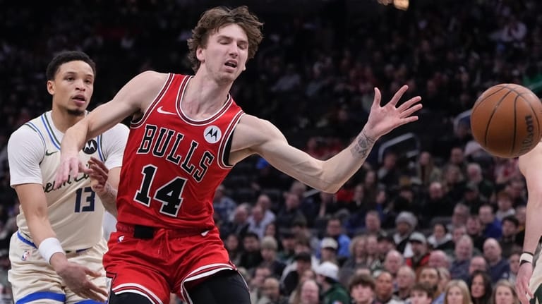 Milwaukee Bucks' Ryan Rollins knocks the ball from Chicago Bulls'...