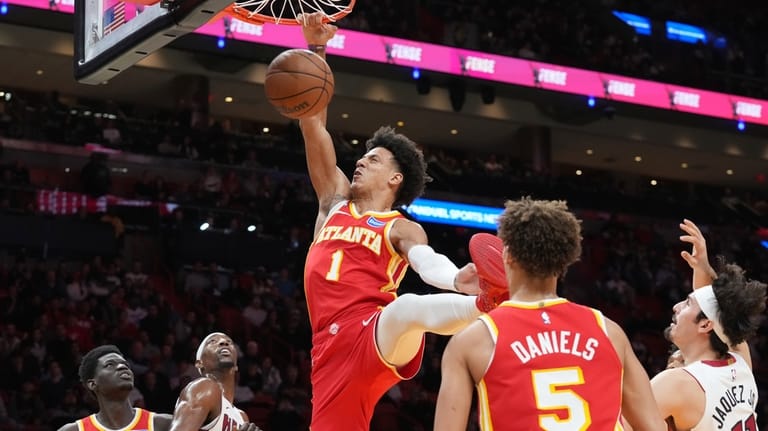 Atlanta Hawks forward Jalen Johnson (1) dunks the ball during...