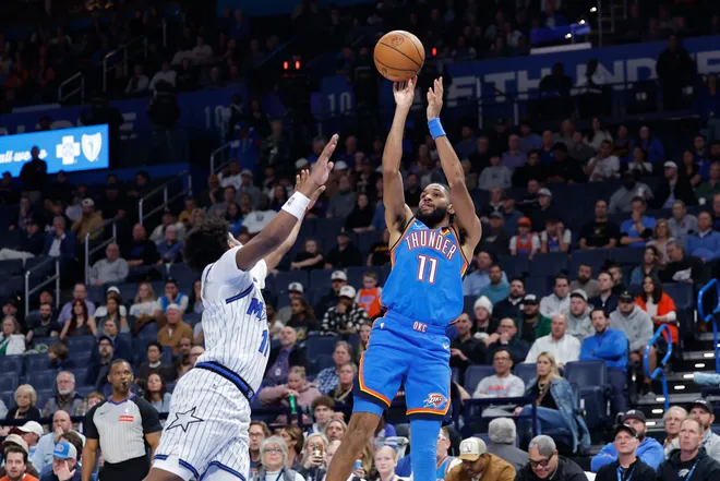 Feb 3, 2026; Oklahoma City, Oklahoma, USA; Oklahoma City Thunder guard Isaiah Joe (11) shoots against the Orlando Magic during the second half at Paycom Center. Mandatory Credit: Alonzo Adams-Imagn Images
