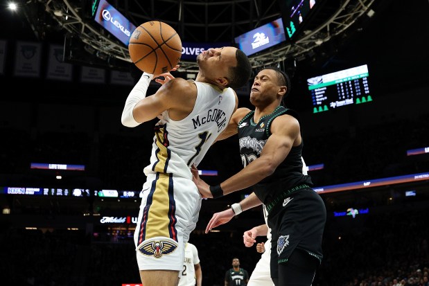 A player tries to block a shot