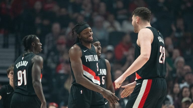 Portland Trail Blazers guard Sidy Cissoko (91), forward Jerami Grant...