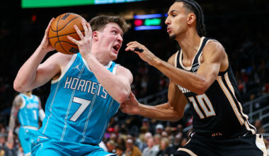Charlotte Hornets guard Kon Knueppel (7) dribbles against Atlanta Hawks forward Zaccharie Risacher (10) during the first half of an NBA basketball game, Saturday, Feb. 7, 2026, in Atlanta. (AP Photo/Colin Hubbard)