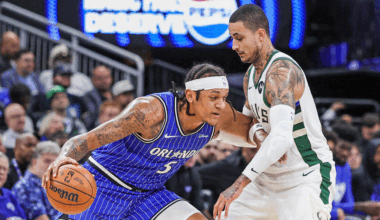 Paolo Banchero (5) drives against Milwaukee Bucks forward Kyle Kuzma (18) during the first quarter at Kia Center.