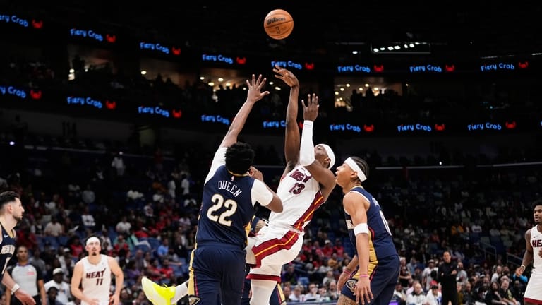 Miami Heat center Bam Adebayo (13) shoots against New Orleans...