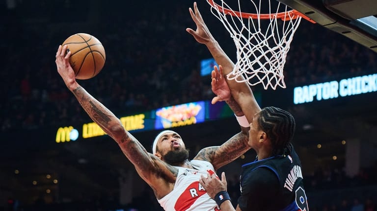 Toronto Raptors' Brandon Ingram (3) drives to the net past...