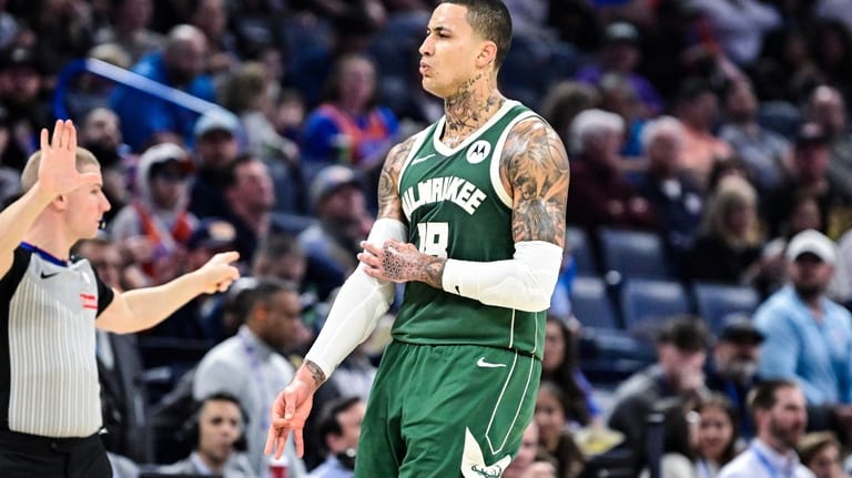 Milwaukee Bucks forward Kyle Kuzma celebrates against the Oklahoma City...