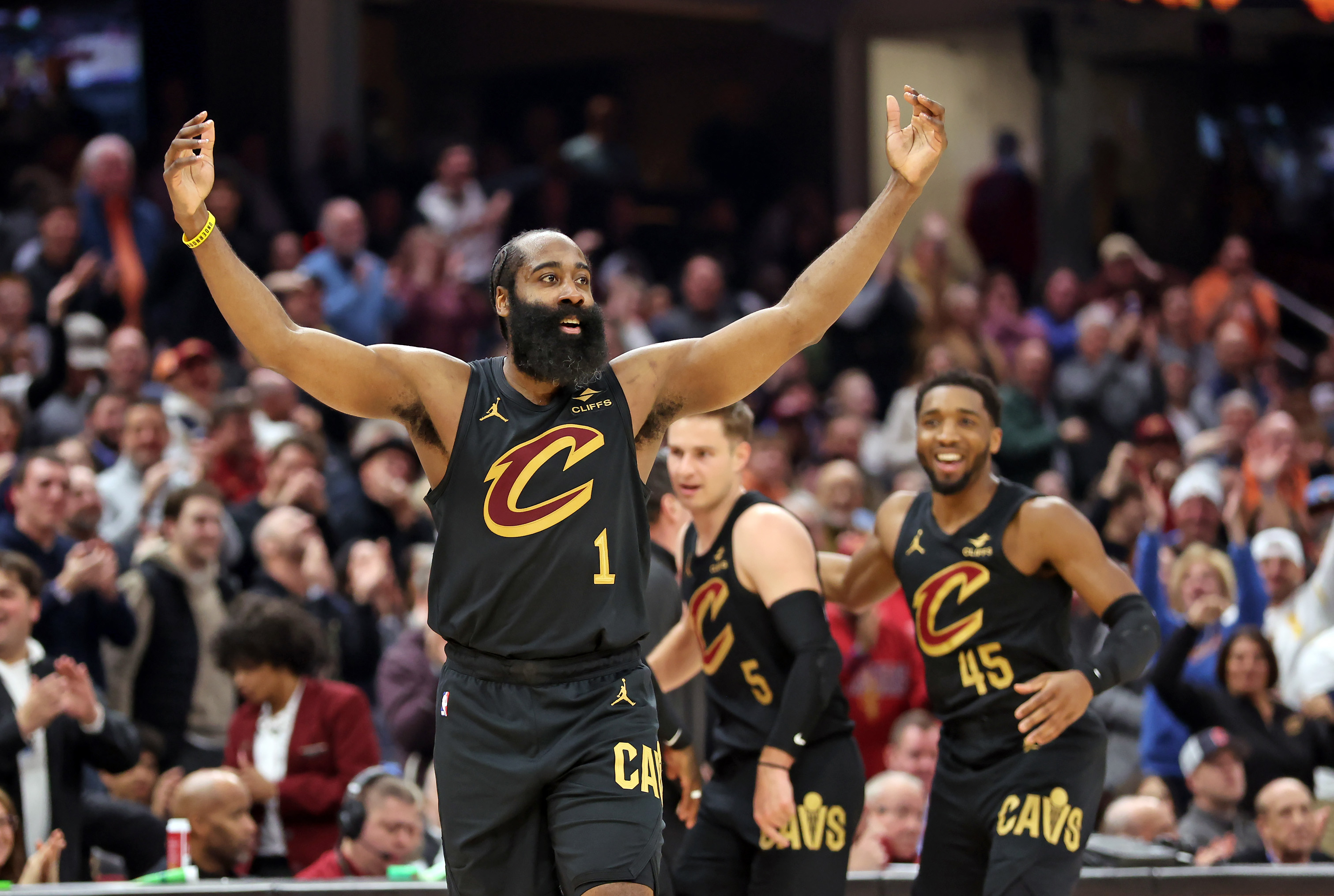 Cleveland Cavaliers guard James Harden celebrates as the Washington Wizards call a time out in the first half of play. 