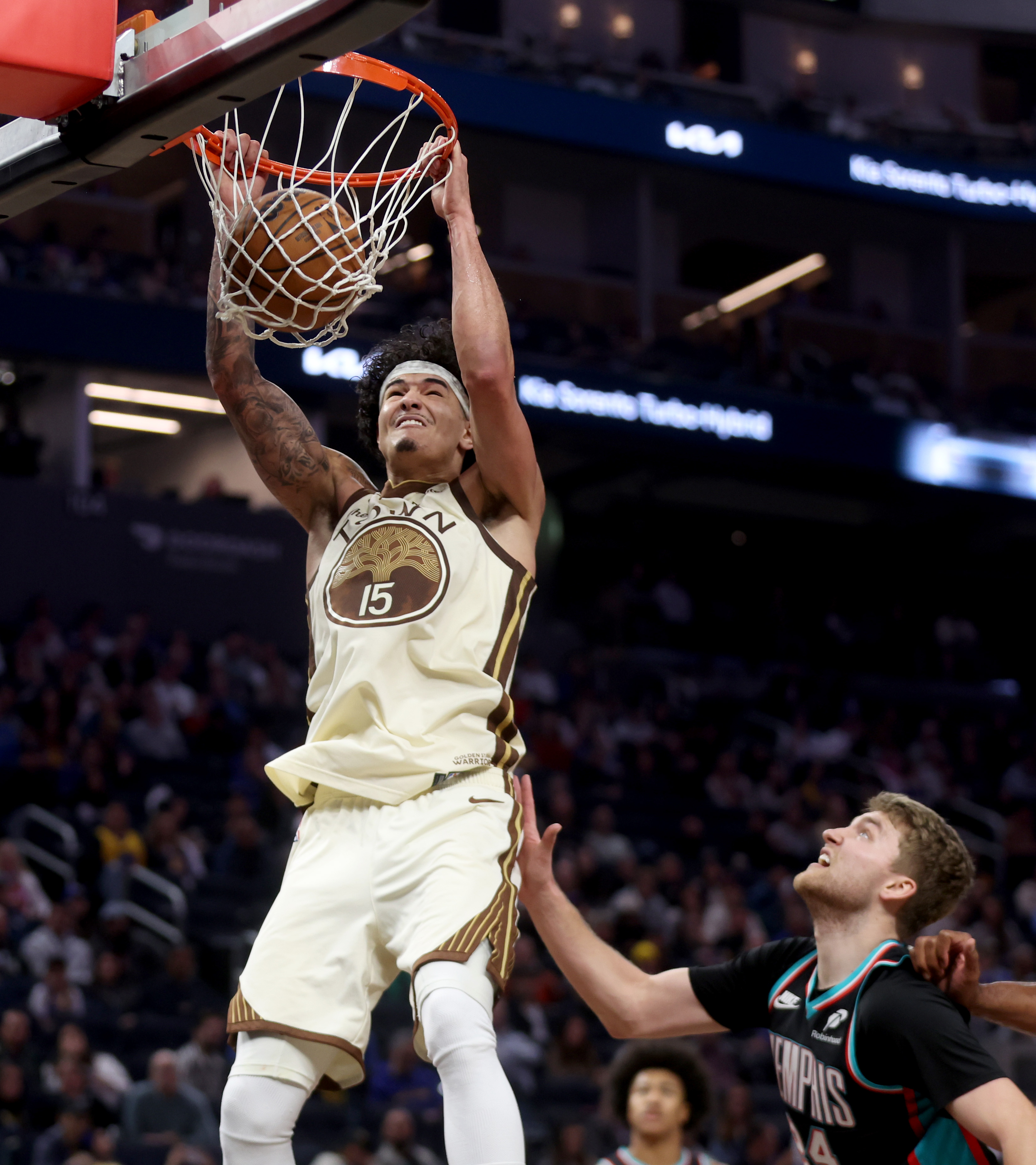 Golden State Warriors' Gui Santos #15 dunks past Memphis Grizzlies'...