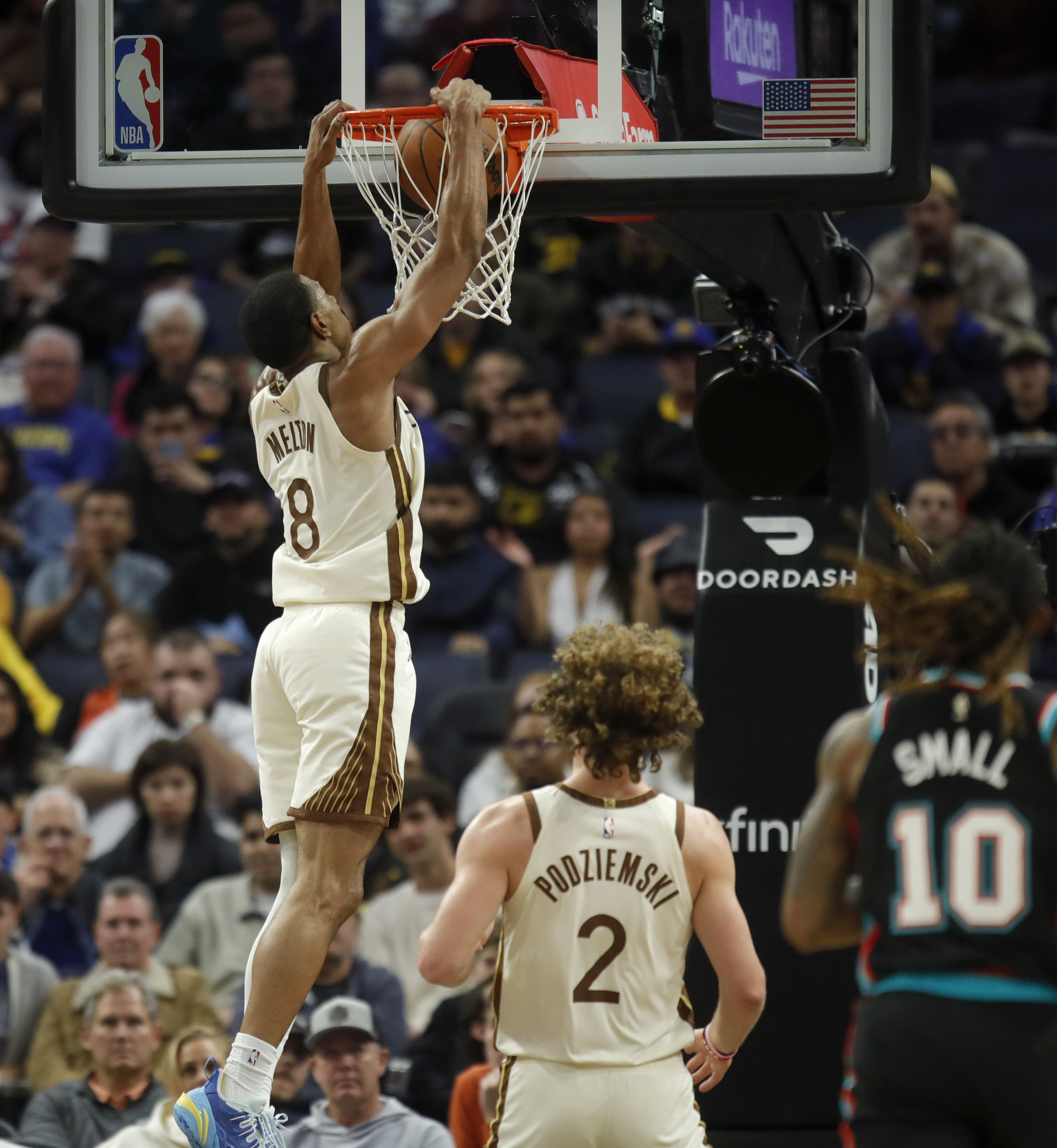 Golden State Warriors' De'anthony Melton #8 dunks in the third...