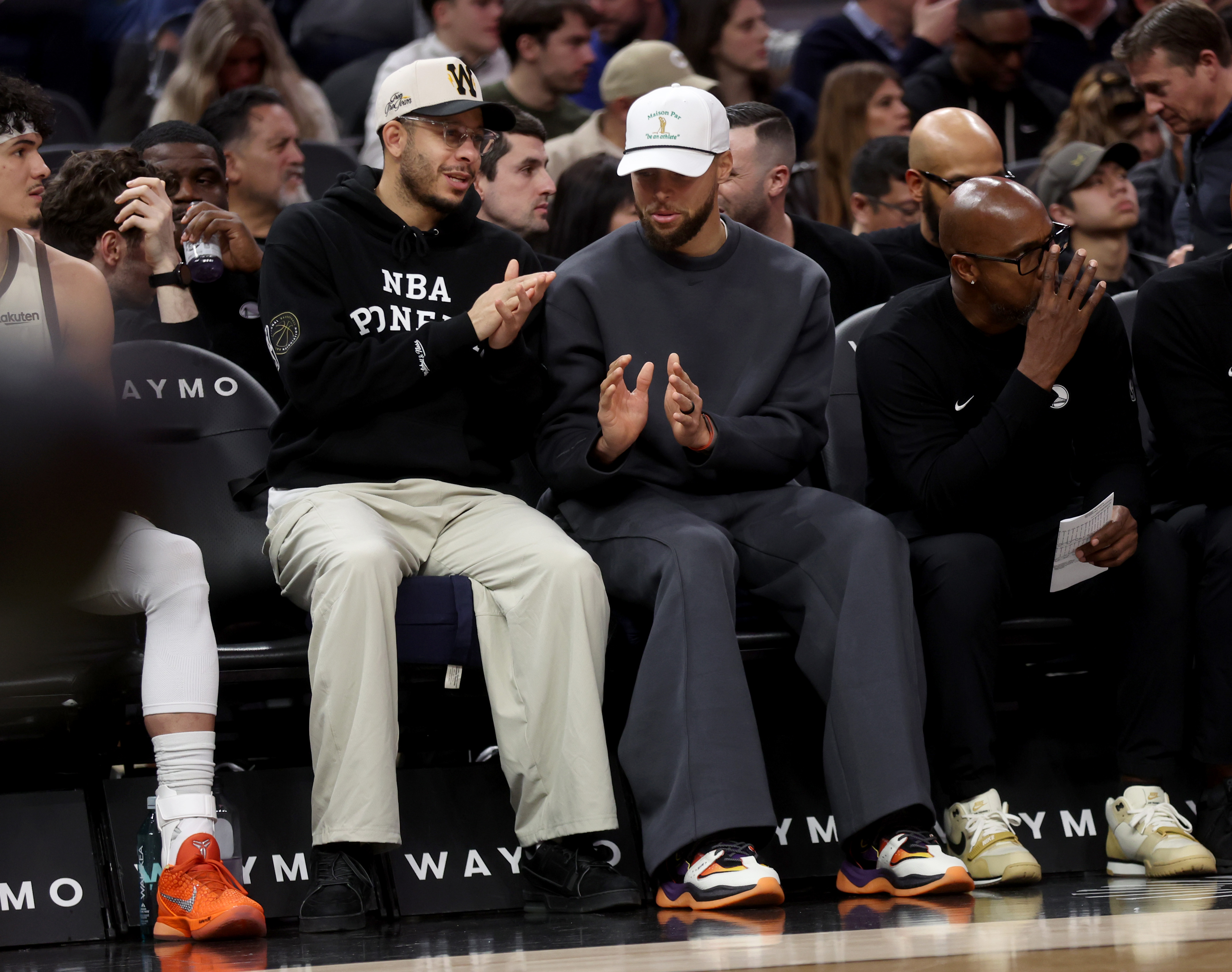 Golden State Warriors' Stephen Curry #30 and his brother Seth...