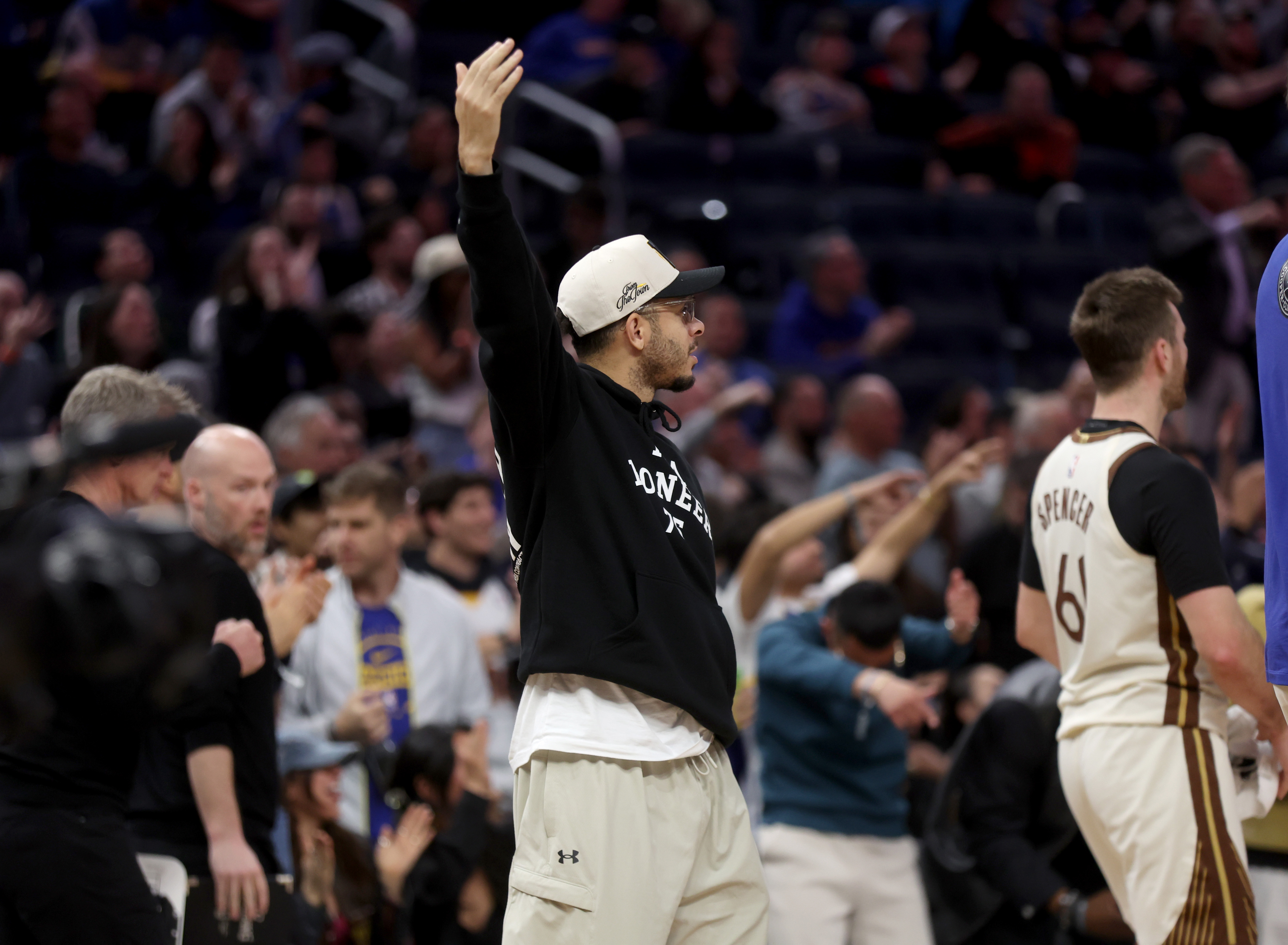 Golden State Warriors' Seth Curry #31 cheers from the bench...