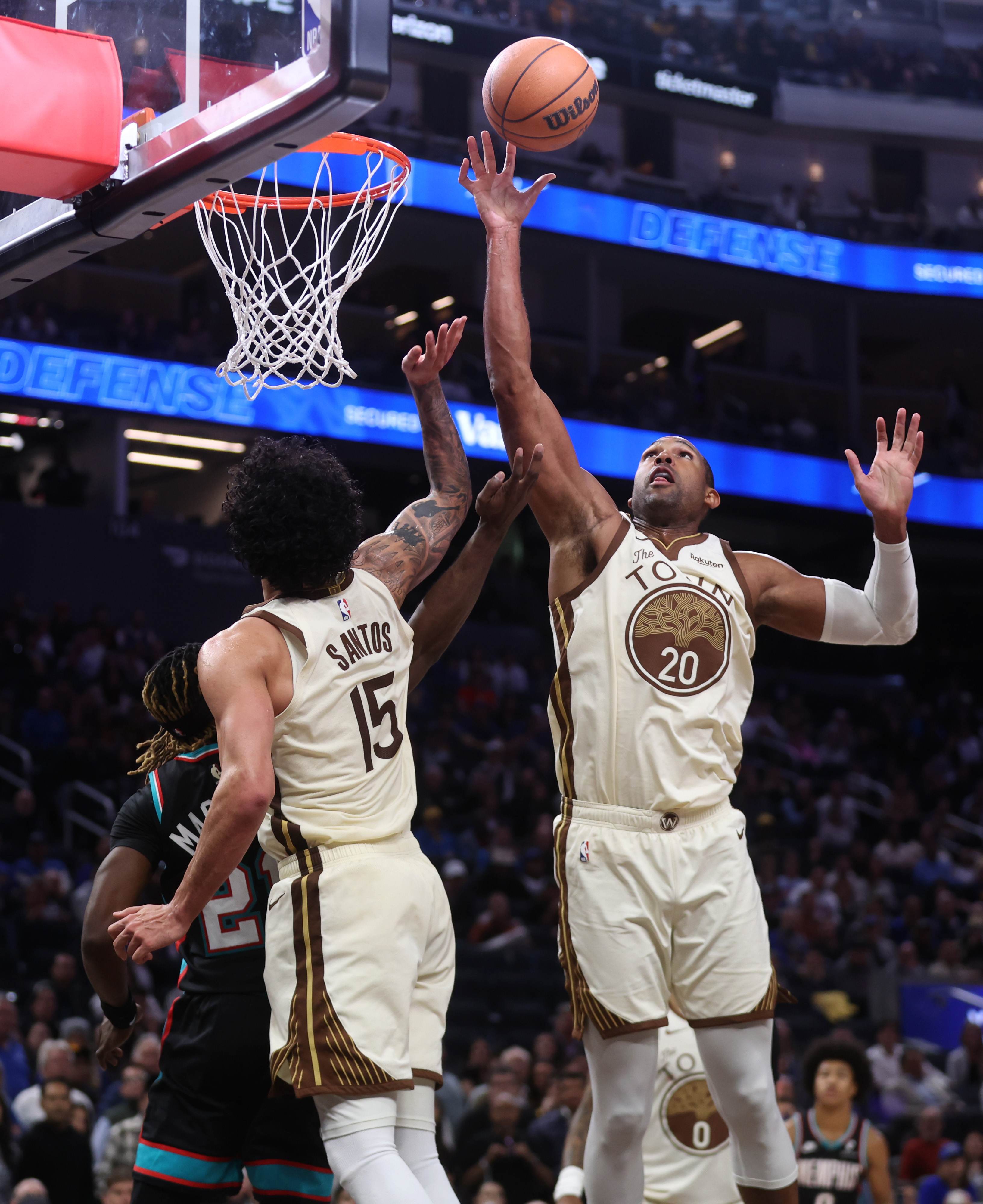 Golden State Warriors' Al Horford #20 grabs a rebound in...