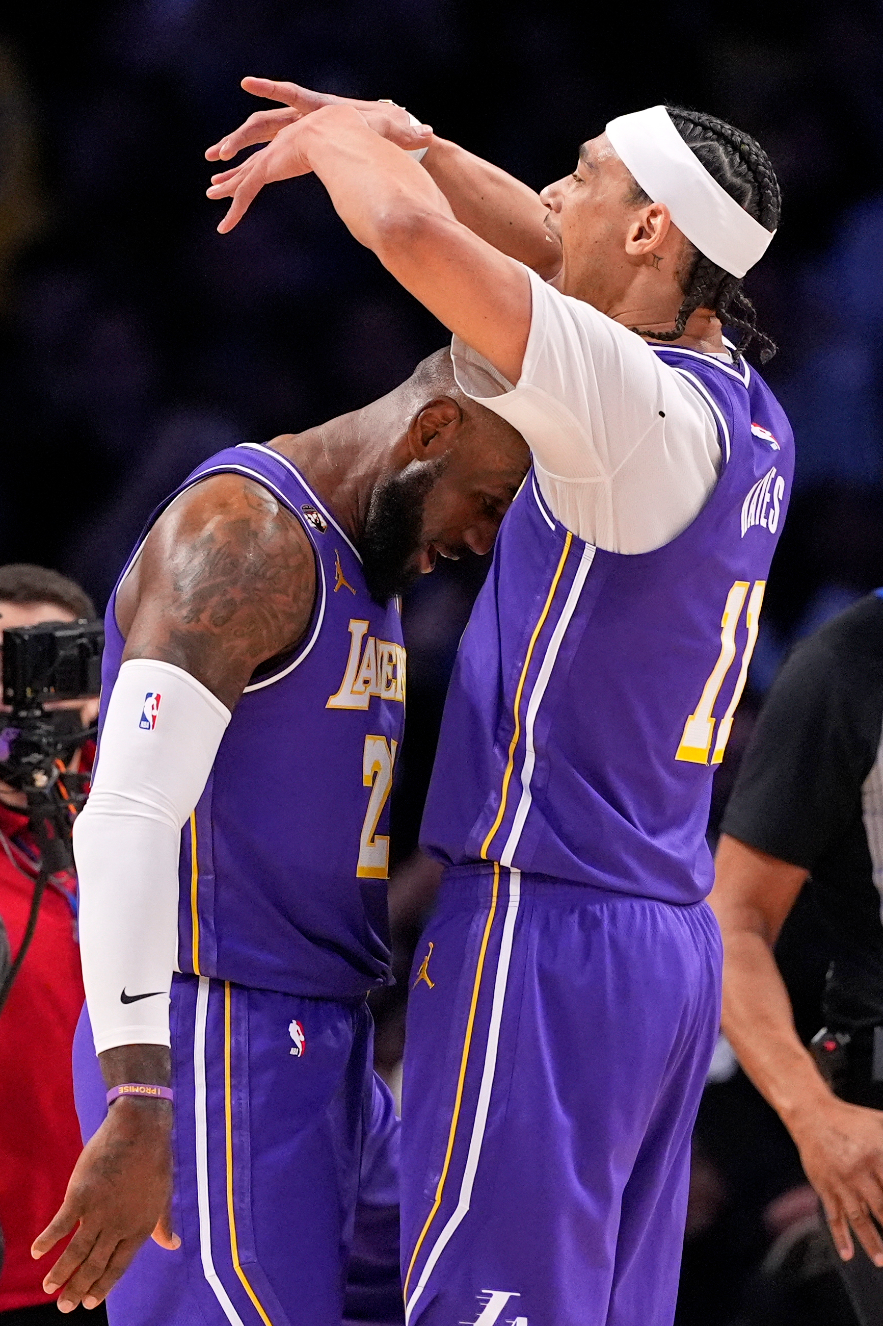 Lakers forward LeBron James, left, celebrates with center Jaxson Hayes...