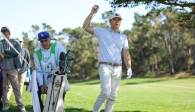 Rick Reilly caddies for Utah Jazz owner Ryan Smith at Pebble Beach