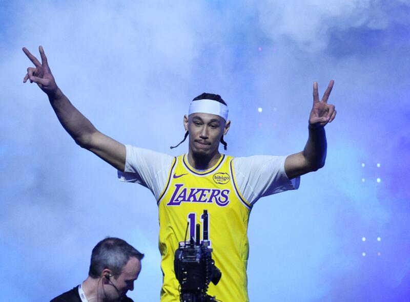 Lakers forward Jaxson Hayes throws up peace signs as he introduced before the NBA all-star dunk contest.